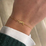 Vitória | Pulseira Monograma Dourada