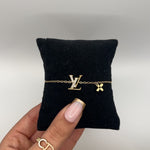 Lara | Pulseira Monograma Dourada